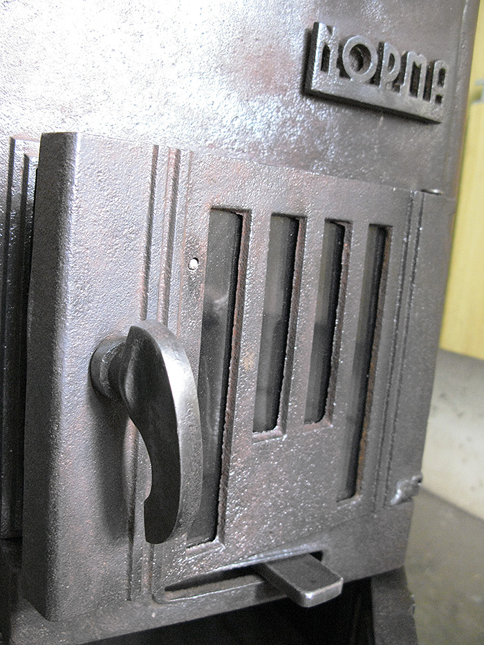 NORMA, a cast iron wood stove made in the 1930's by an extinct manufacturer of exquisite products in Greece