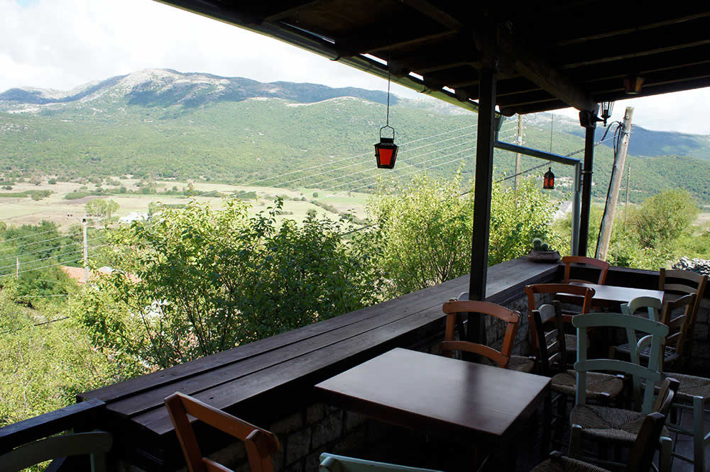 The commanding view of the tavern in Kato Pedina towards the plains of Soudena in Central Zagori, Epirus