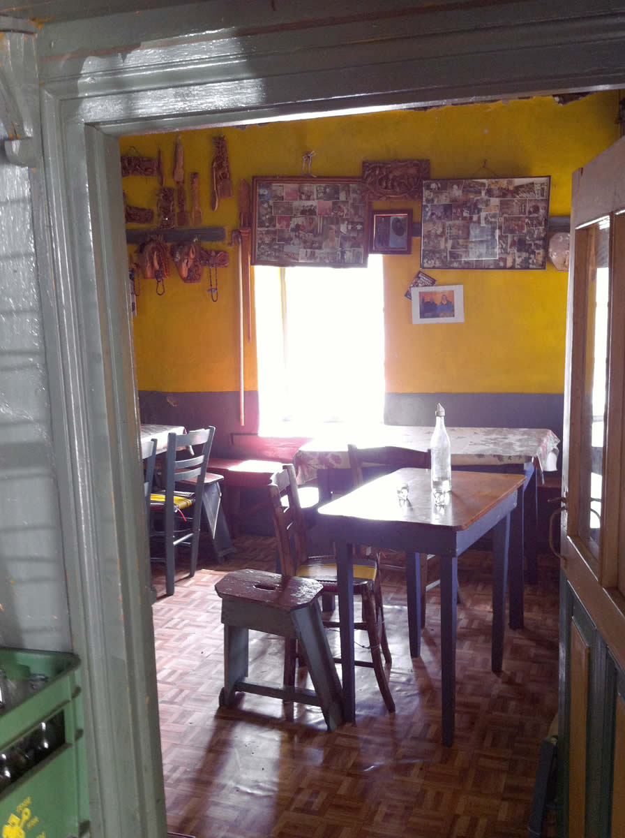 The traditional kafeneion lays by the cobble paved path that leads to the centre of the village of Elafotopos (Tservari as it is locally known) and has a calm and easy view of the valley of Soudena (Pedina)from an altitude of about 1.000m